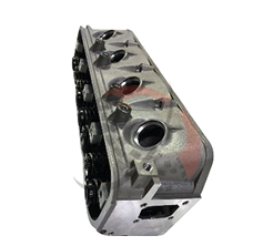 Forklift engine cylinder head showcasing high-quality design, relevant to maintenance and rebuilds, featured in engine parts selection by Mandarin Imports & Exports.