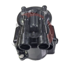 Distributor cap for forklifts, showcasing dual connection ports, relevant to engine parts for maintenance and rebuilds.