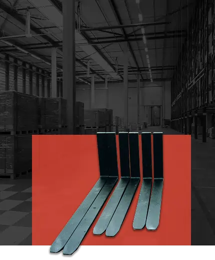 Lift equipment forks displayed on a red background, set against a blurred industrial warehouse interior, emphasizing worksite solutions for Australian businesses.