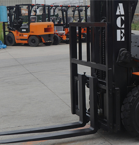 Forklift tines from ACE brand with additional forklifts in the background, showcasing high-quality warehouse equipment for industrial operations.